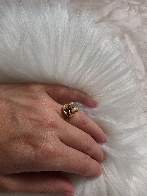 Bague spinner fleur dorée