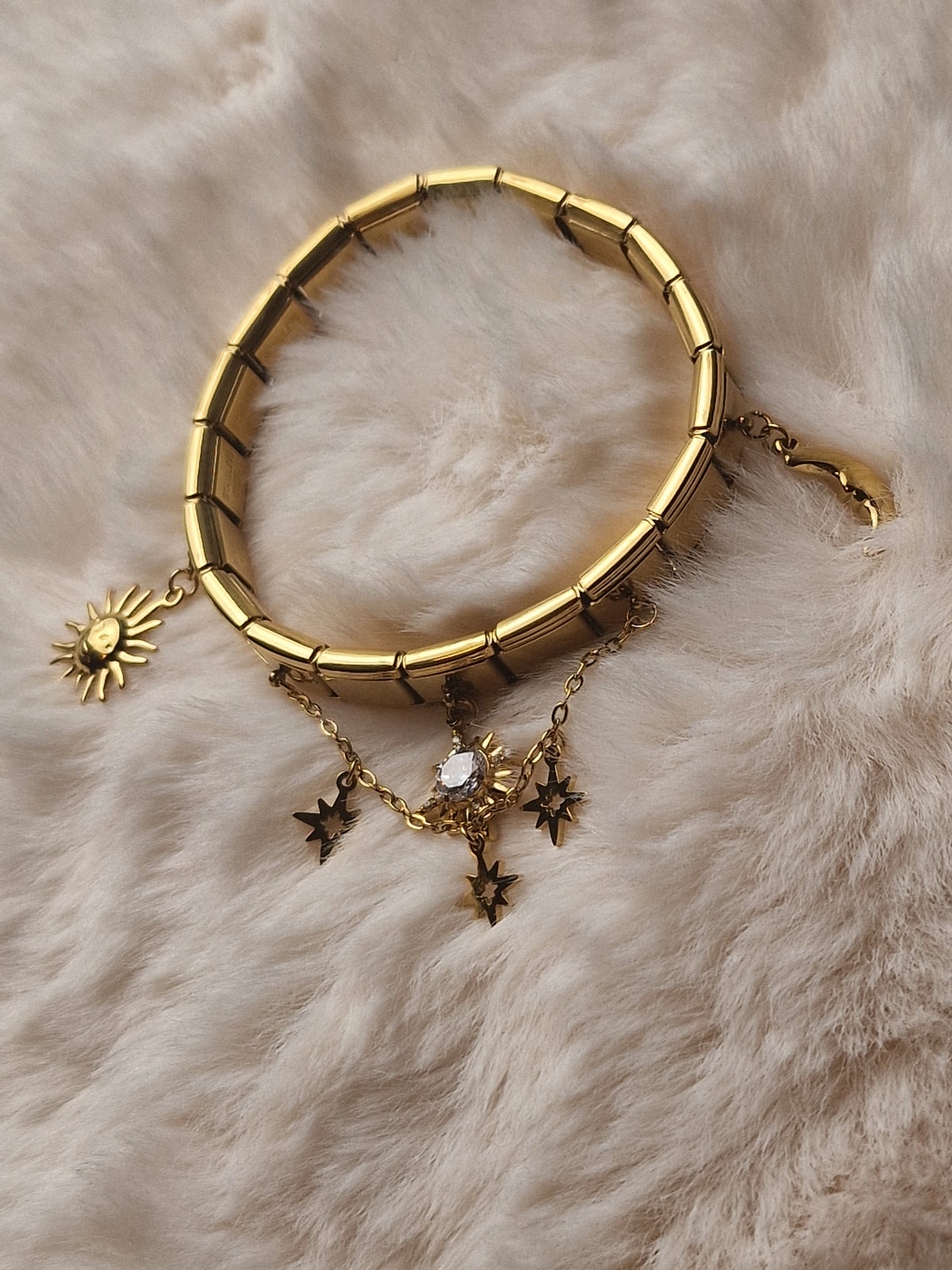 Bracelet à maille italienne dorée, étoiles et soleil