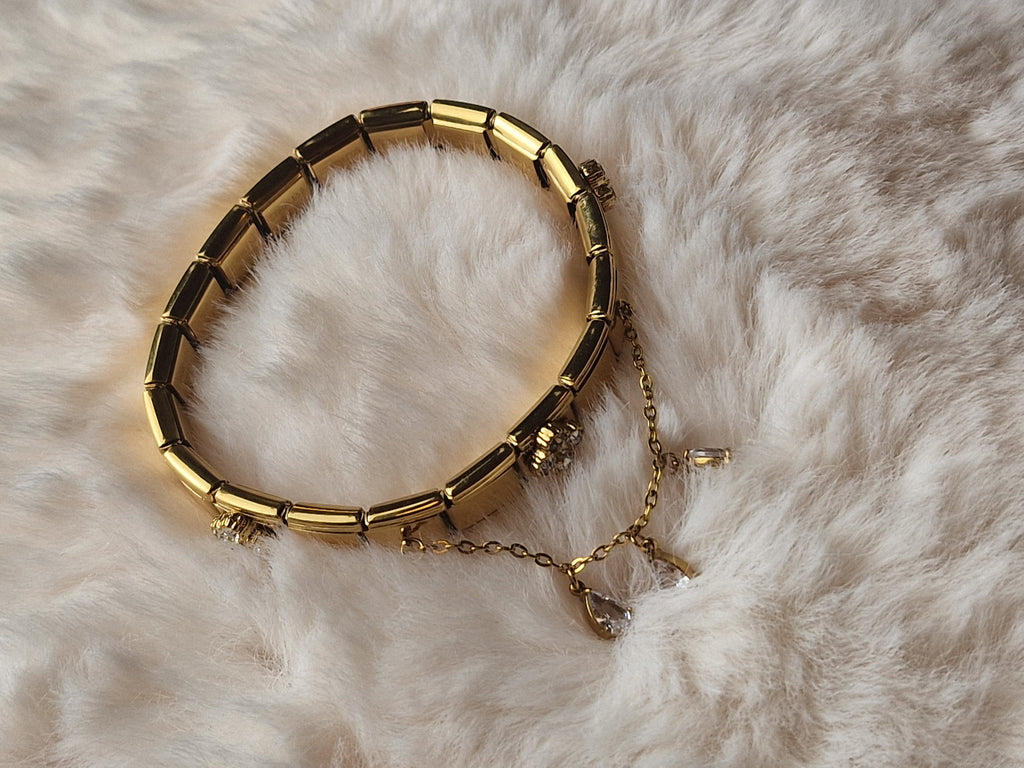 Bracelet à maille italienne dorée, gouttes et rosaces