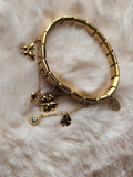 Bracelet à maille italienne dorée, trèfles