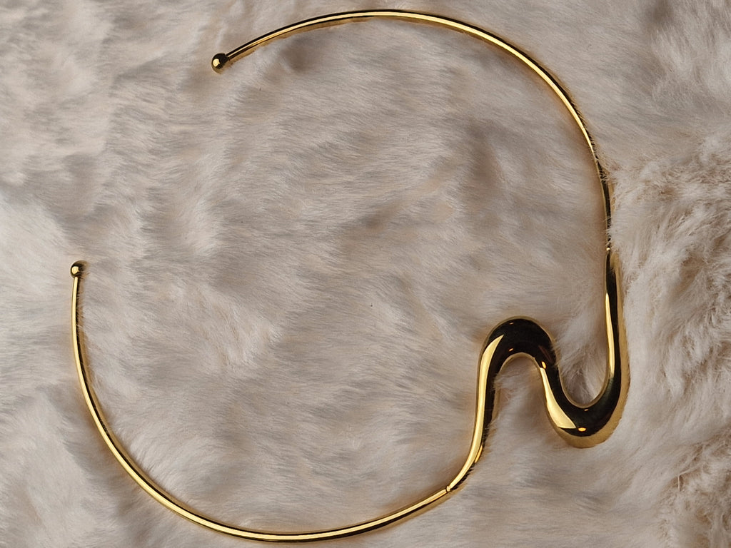 Collier torque ondulé doré acier inox